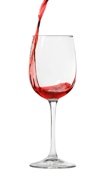 Pouring red wine into glass — Stock Photo, Image