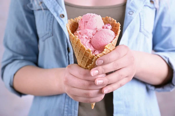 Woman holding cone with ice cream — Stock Photo, Image