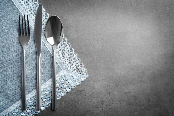 Table setting with silver cutlery — Stock Photo, Image