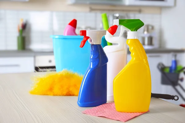 Cleaning supplies on table — Stock Photo, Image