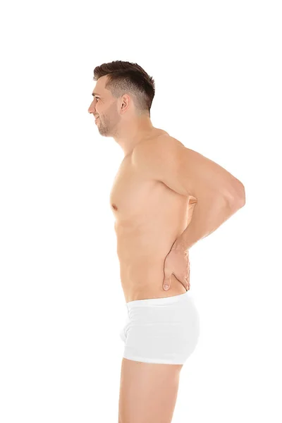 Young man suffering from back pain — Stock Photo, Image