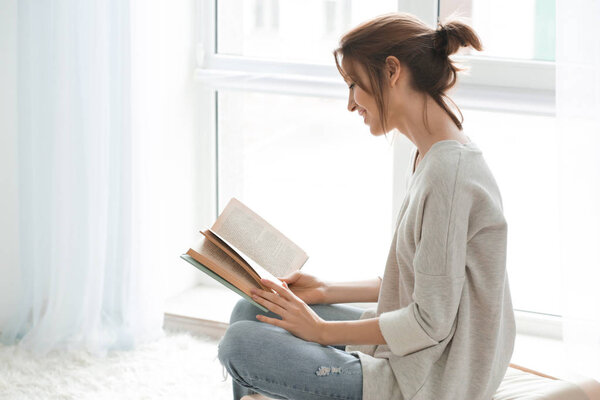 woman reading book 