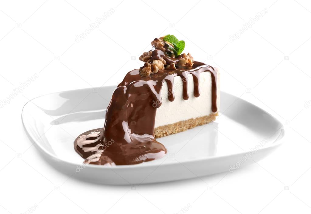 Plate with delicious cheesecake slice