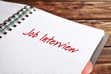 Metin iş görüşmesi defterde yazılı 