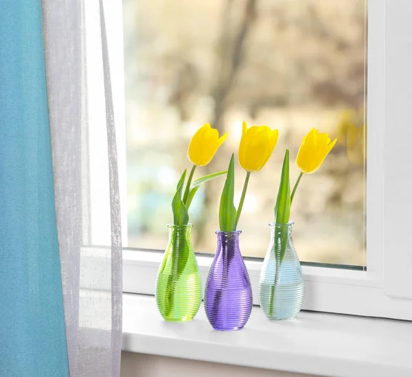 Vases with beautiful tulips — Stock Photo, Image