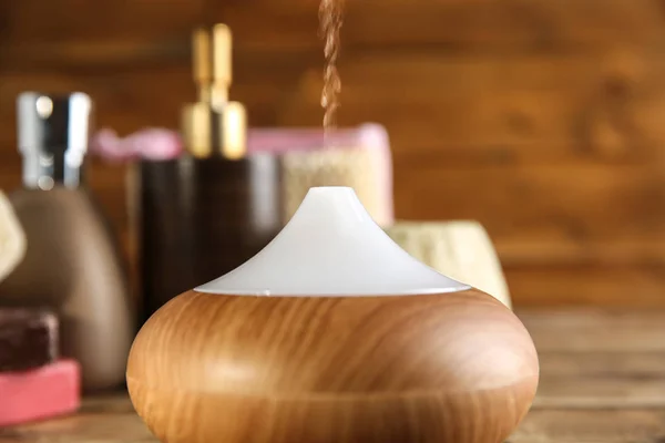 Oil diffuser on background — Stock Photo, Image