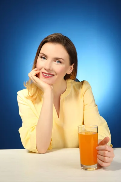 Beautiful Woman Sitting Table Glass Fresh Juice Color Background — Stock Photo, Image