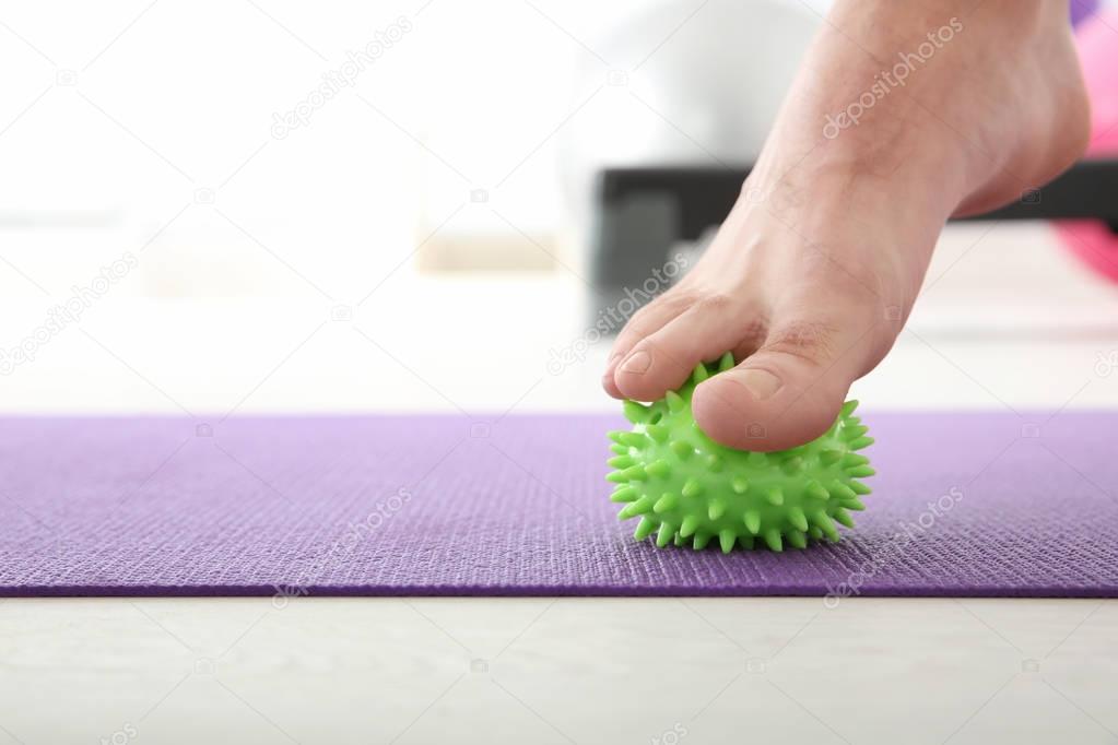 man doing exercises with stress ball 