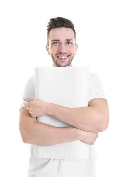 Young man with orthopedic pillow — Stock Photo, Image