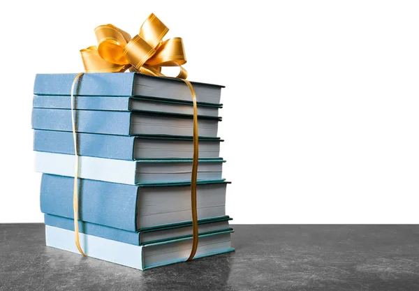 Stack of books with ribbon — Stock Photo, Image