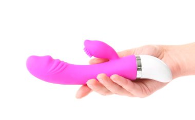 Vibratör beyaz arka plan üzerinde tutan kadın