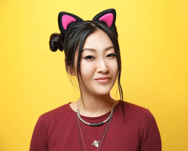 Kvinde i kat ører - Stock-foto