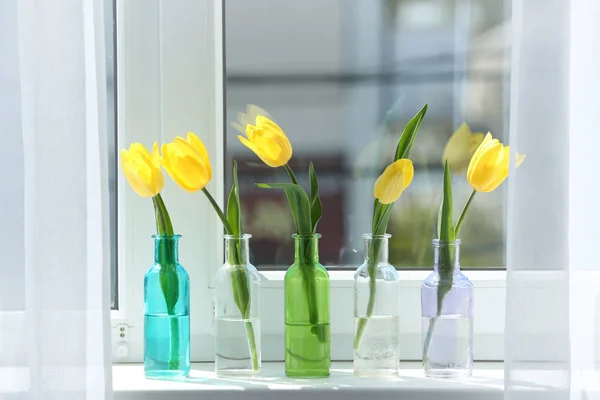 Vases with beautiful tulips — Stock Photo, Image