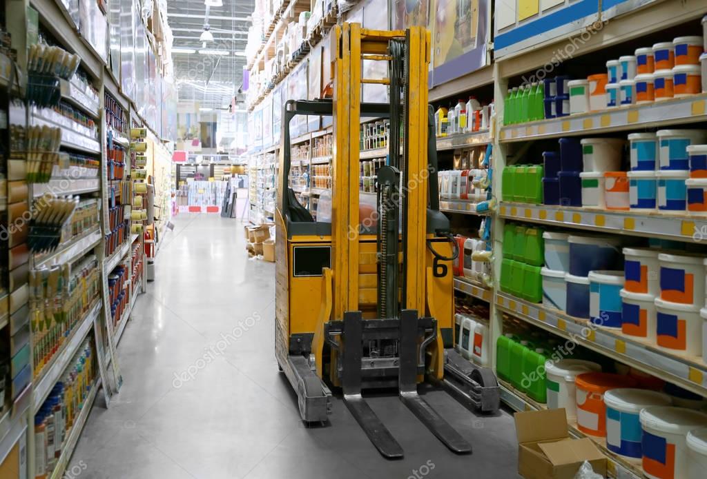 Stacking truck in warehouse — Stock Photo © belchonock 152143130