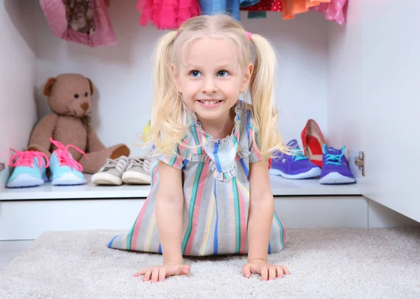 Cute girl in wardrobe — Stock Photo, Image
