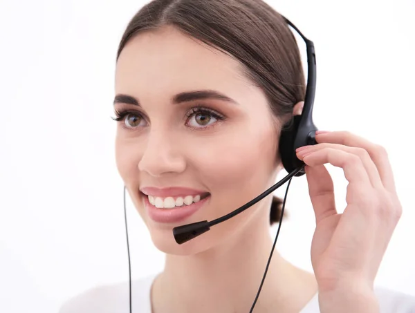 Woman with headset indoors — Stock Photo, Image
