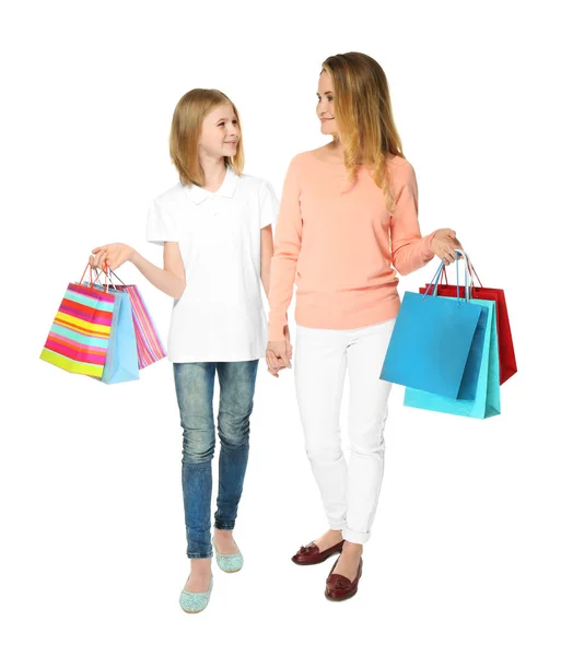 Madre e hija con bolsas de papel — Foto de Stock