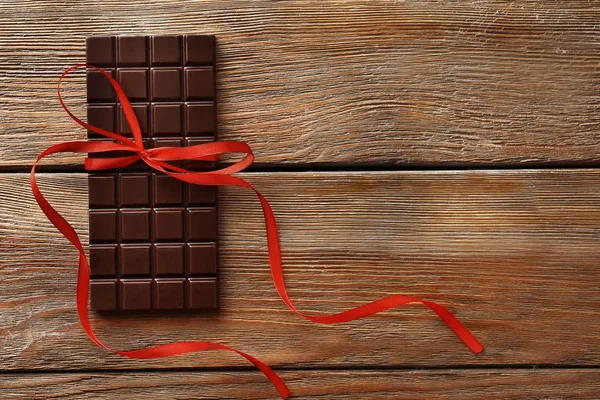 Barra de chocolate con cinta — Foto de Stock