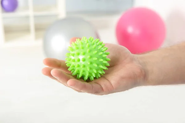 Male hand with stress ball