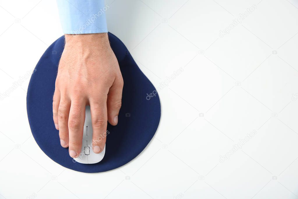 Male hand with computer mouse  