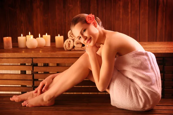 Beautiful young woman in sauna — Stock Photo, Image