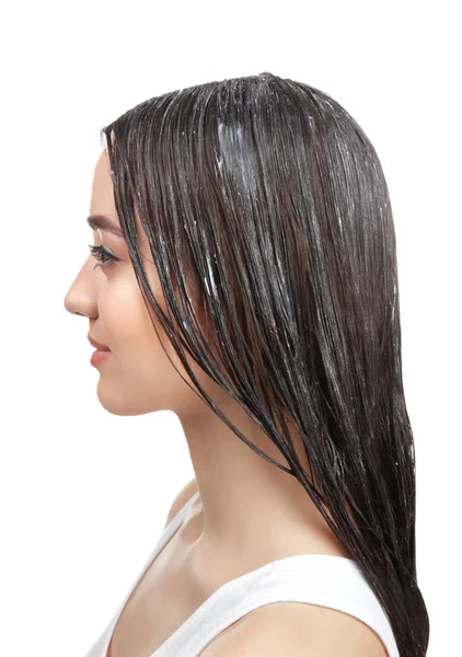 Mulher com óleo de coco aplicado no cabelo — Fotografia de Stock