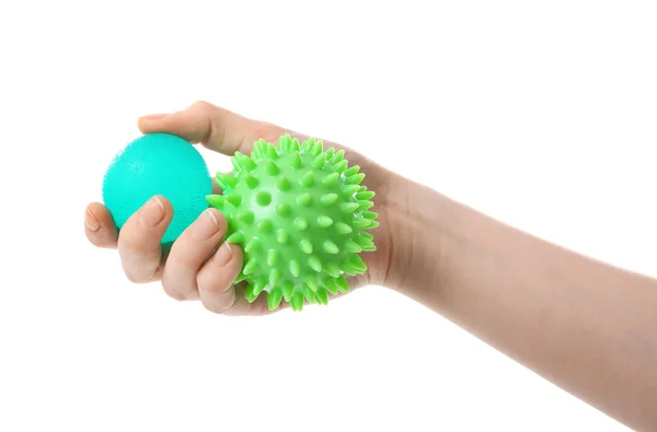 Vrouwelijke hand met stress ballen — Stockfoto