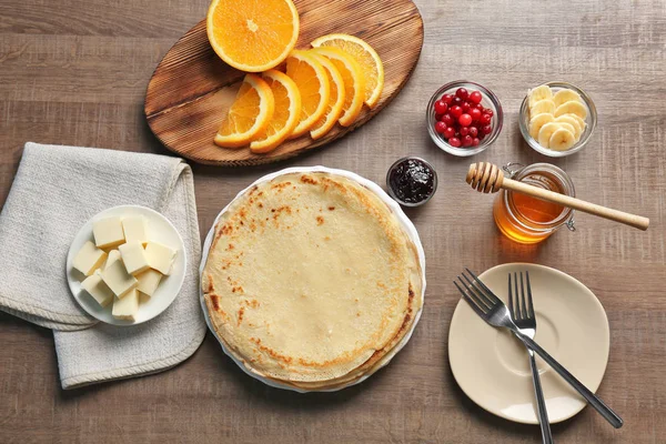 Delicious pancakes and ingredients — Stock Photo, Image