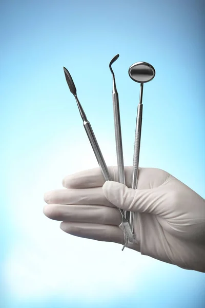 Hand holding dental equipment — Stock Photo, Image