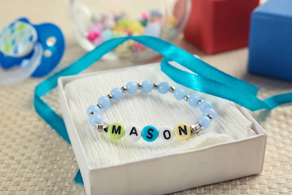 Bracelet with baby name Mason — Stock Photo, Image