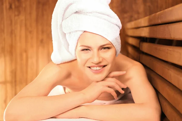 Young woman in sauna — Stock Photo, Image