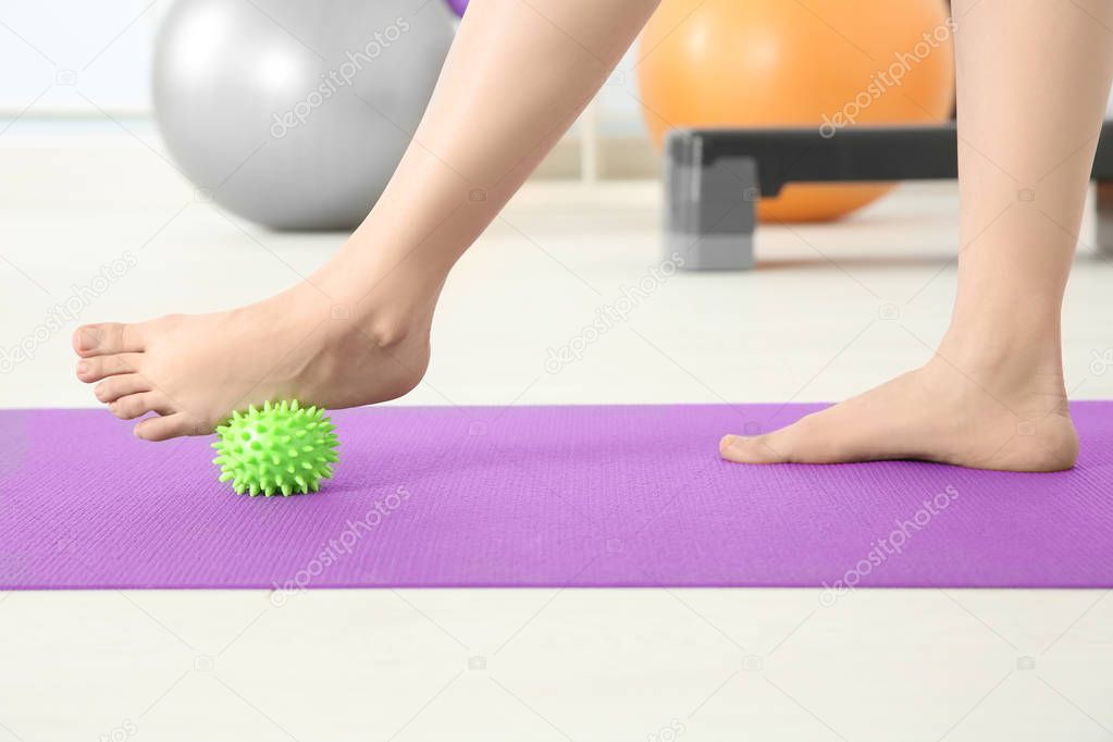 Feet of woman doing exercises 