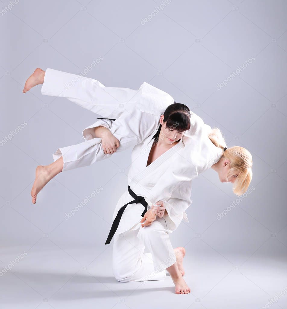 Women practicing martial arts 
