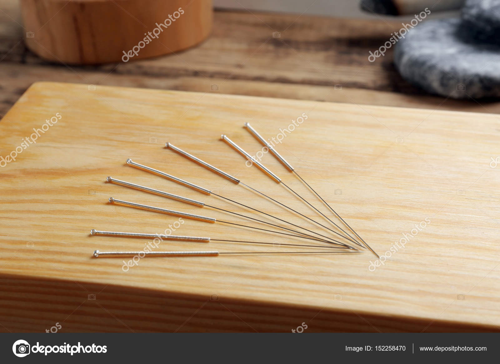 Acupuncture needles on board — Stock Photo © belchonock 152258470
