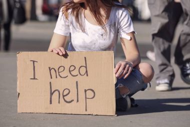 Poor woman begging for help  clipart