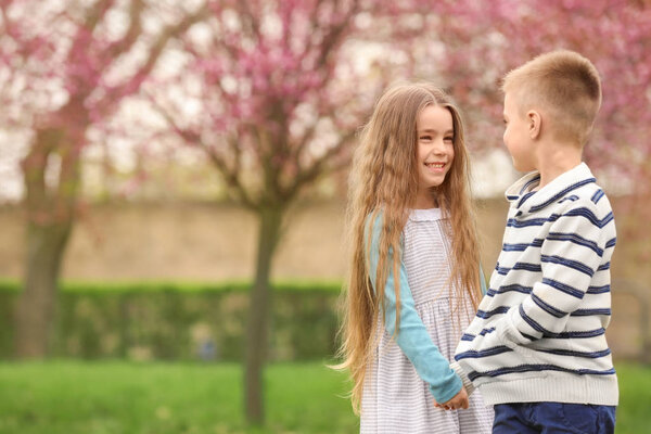 girl and boy in spring park