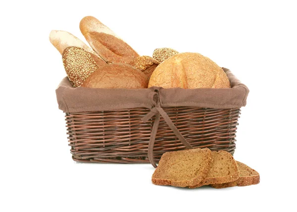 Wicker basket with fresh bread — Stock Photo, Image