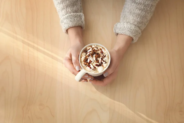 woman with cup of cocoa drink