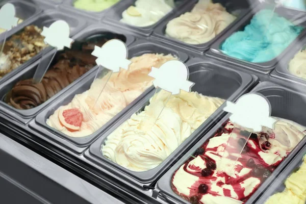 ice cream in metal tubs