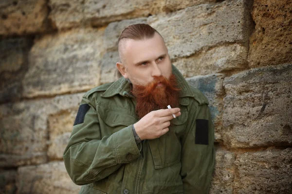 Bearded man smoking weed