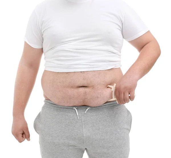 Hombre gordo con pinza de medición — Foto de Stock