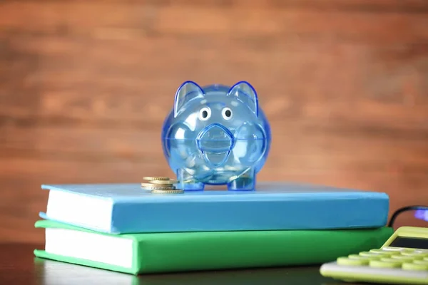 Transparant blauw piggy bank — Stockfoto