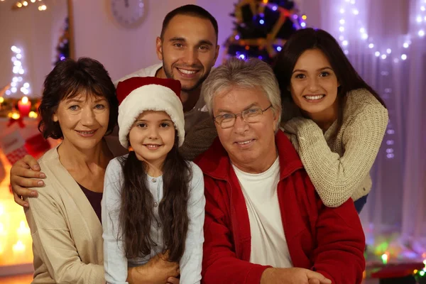 Happy family in living room decorated for Christmas