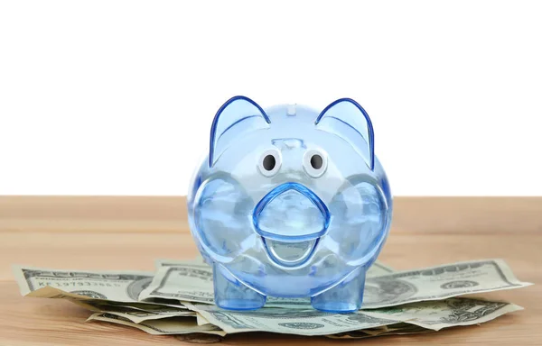 Transparant blauw piggy bank — Stockfoto