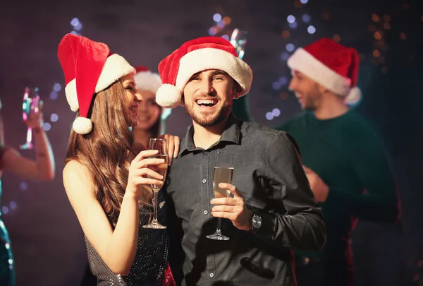 Friends at Christmas party in night club — Stock Photo, Image