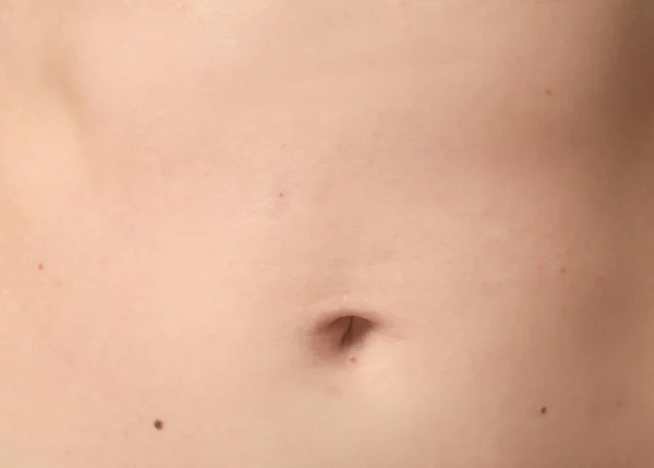 Barriga da jovem, close-up — Fotografia de Stock