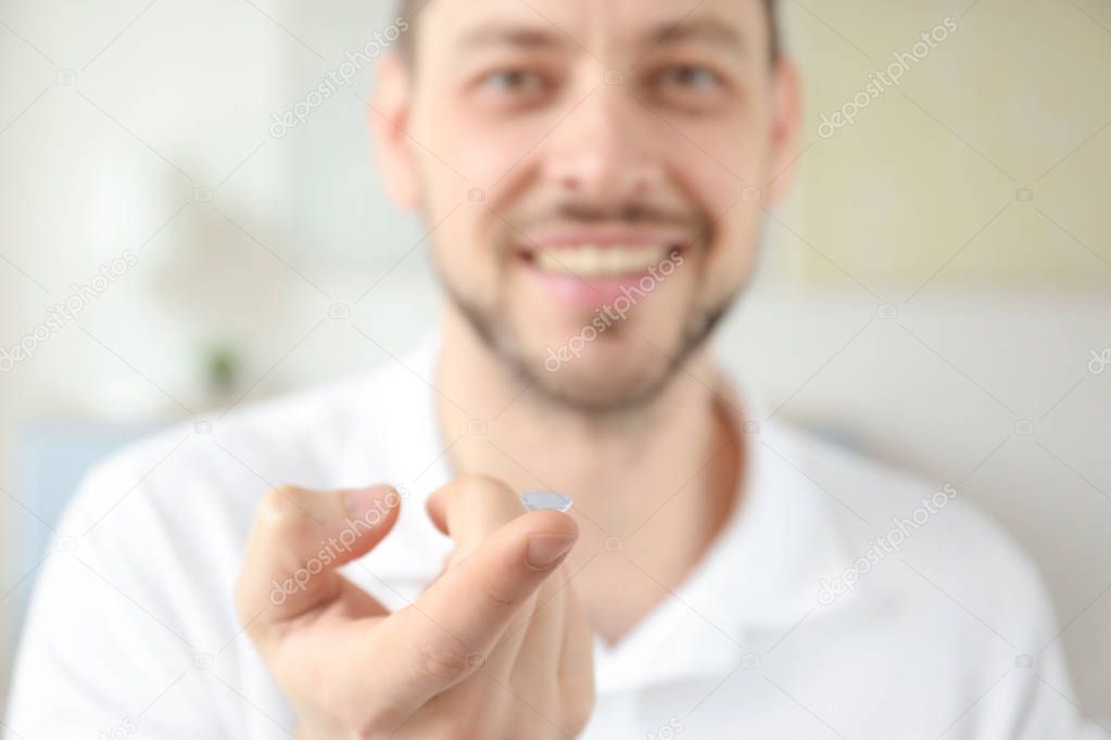 young man with contact lens