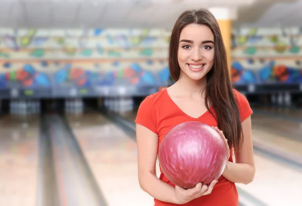 Beautiful young woman with ball — Stock Photo, Image