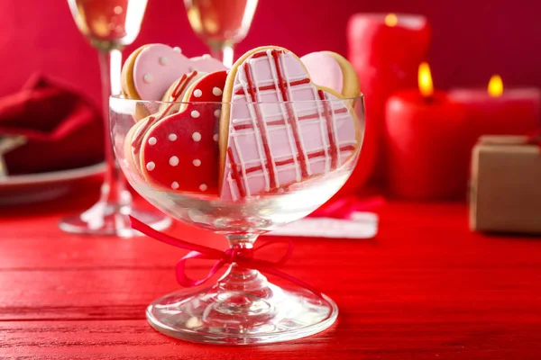 Glass vase with heart shaped cookies — Stock Photo, Image