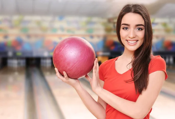 Beautiful young woman with ball — Stock Photo, Image